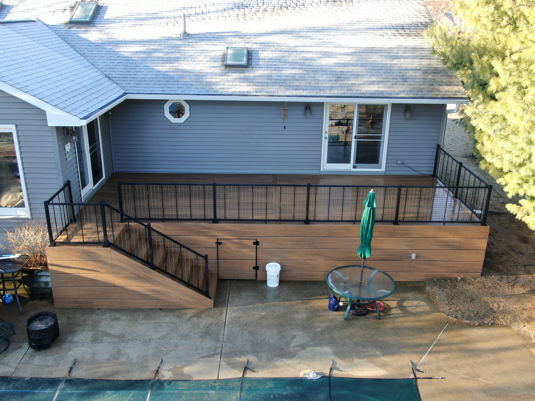 Aerial view of finished deck with black railing