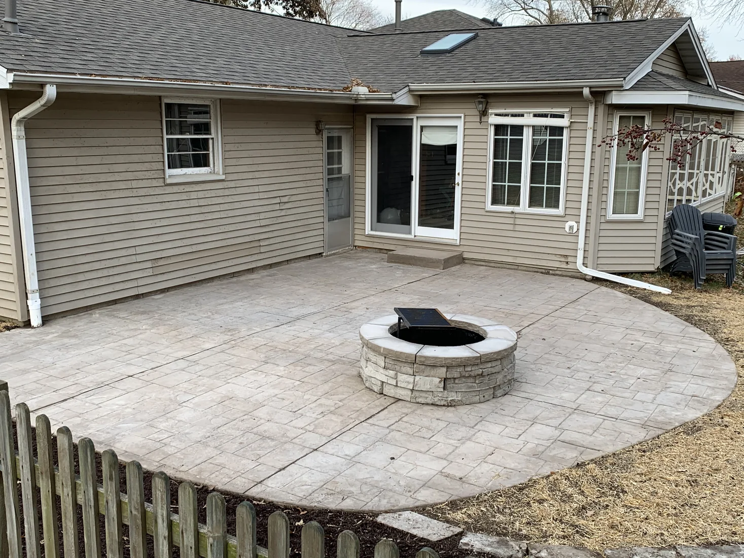 Backyard patio with central fire pit