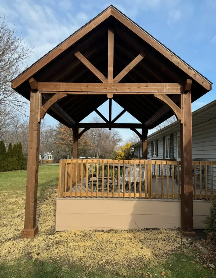 Wood pavilion with seating and pavers