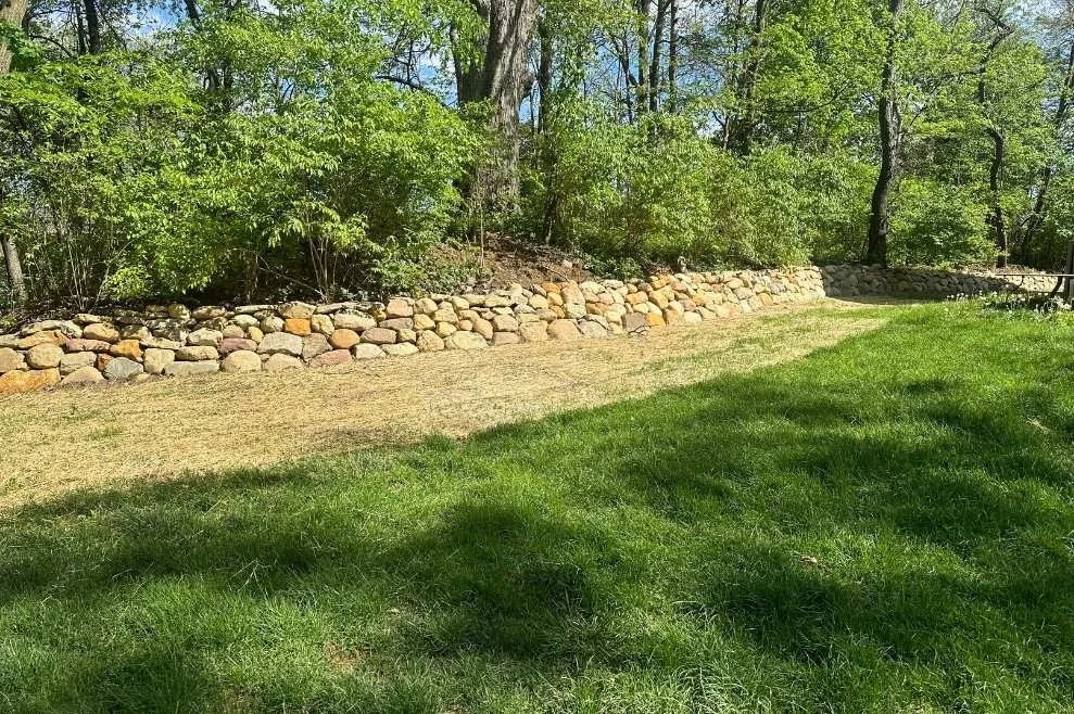 New lawn installation on a sloped property