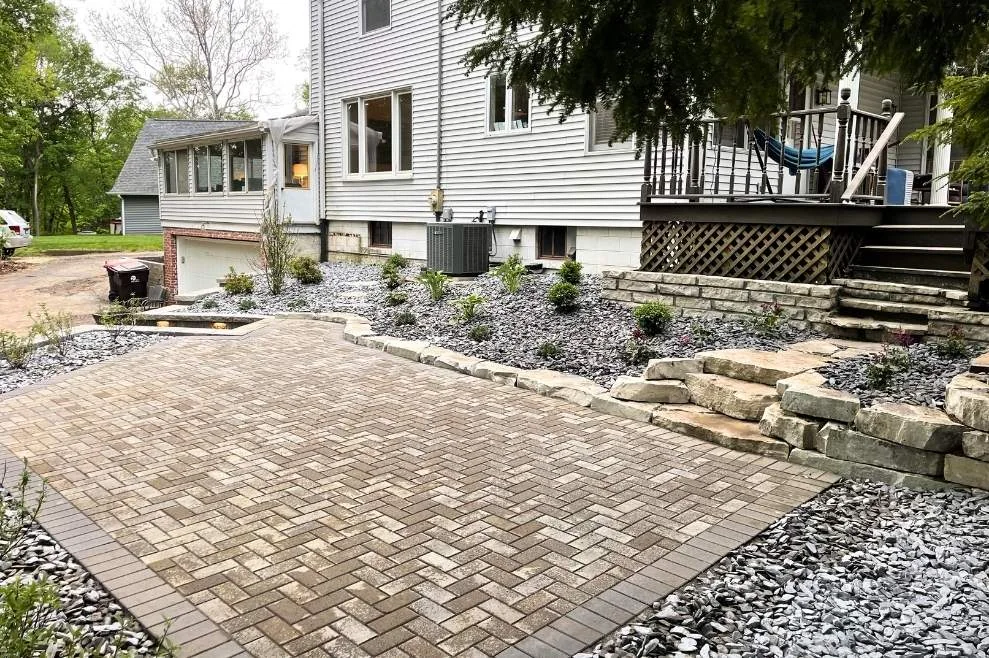Paver patio and seating area under construction